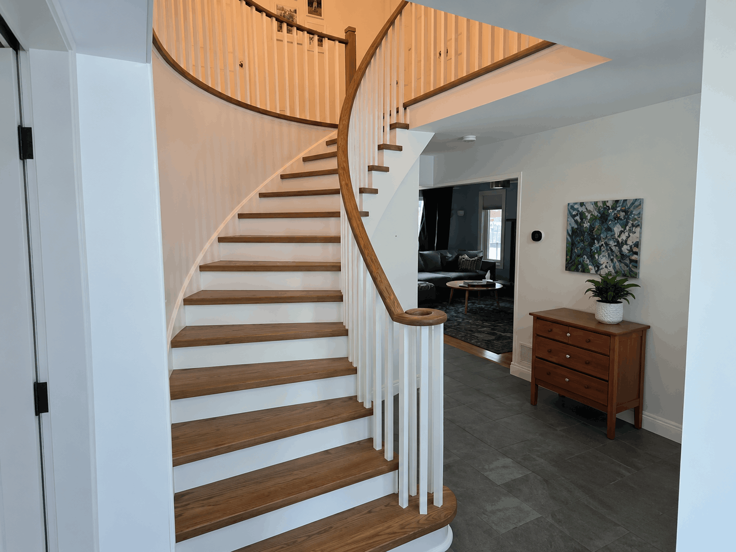 Curved Oak Staircase Renovation with White Risers